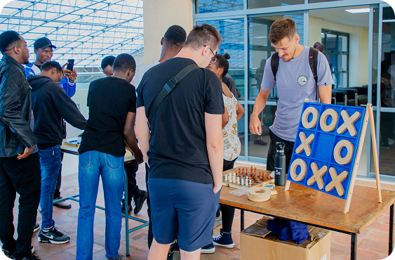 Attendees at a sponsor booth during droidcon Kenya